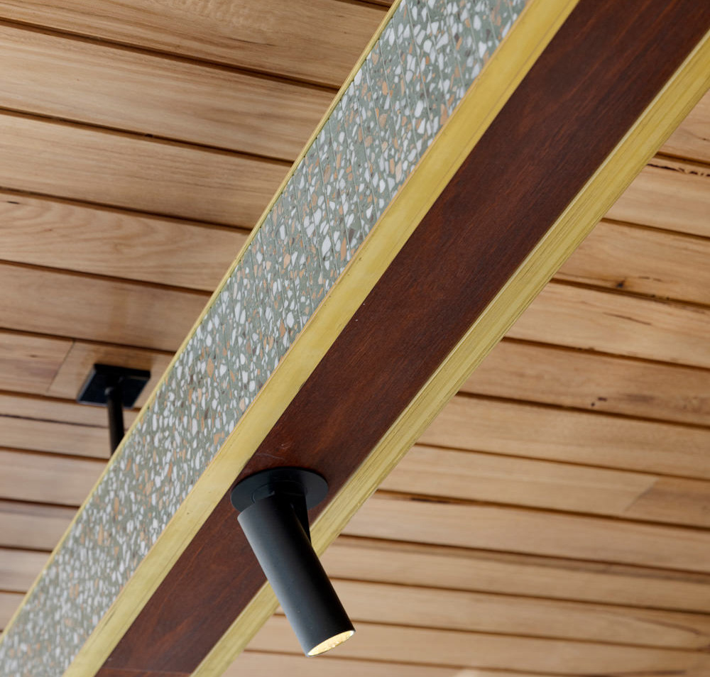Beautiful mix of native solid timbers, Terrazzo and solid brass.